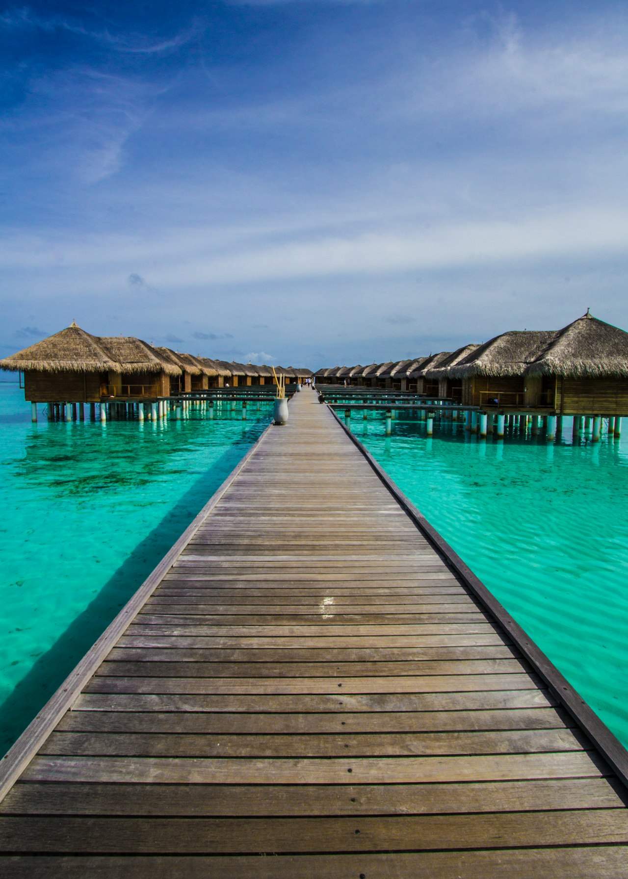 Overwater bungalows on turquoise lagoon, Mauritius