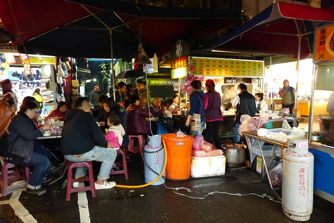 A beef noodle soup stall in Raohe Night Market, Taipei