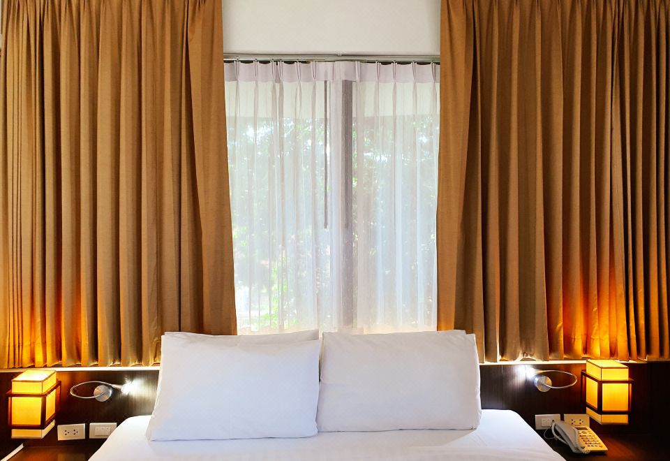 Hotel M Chiang Mai double room with warm lighting