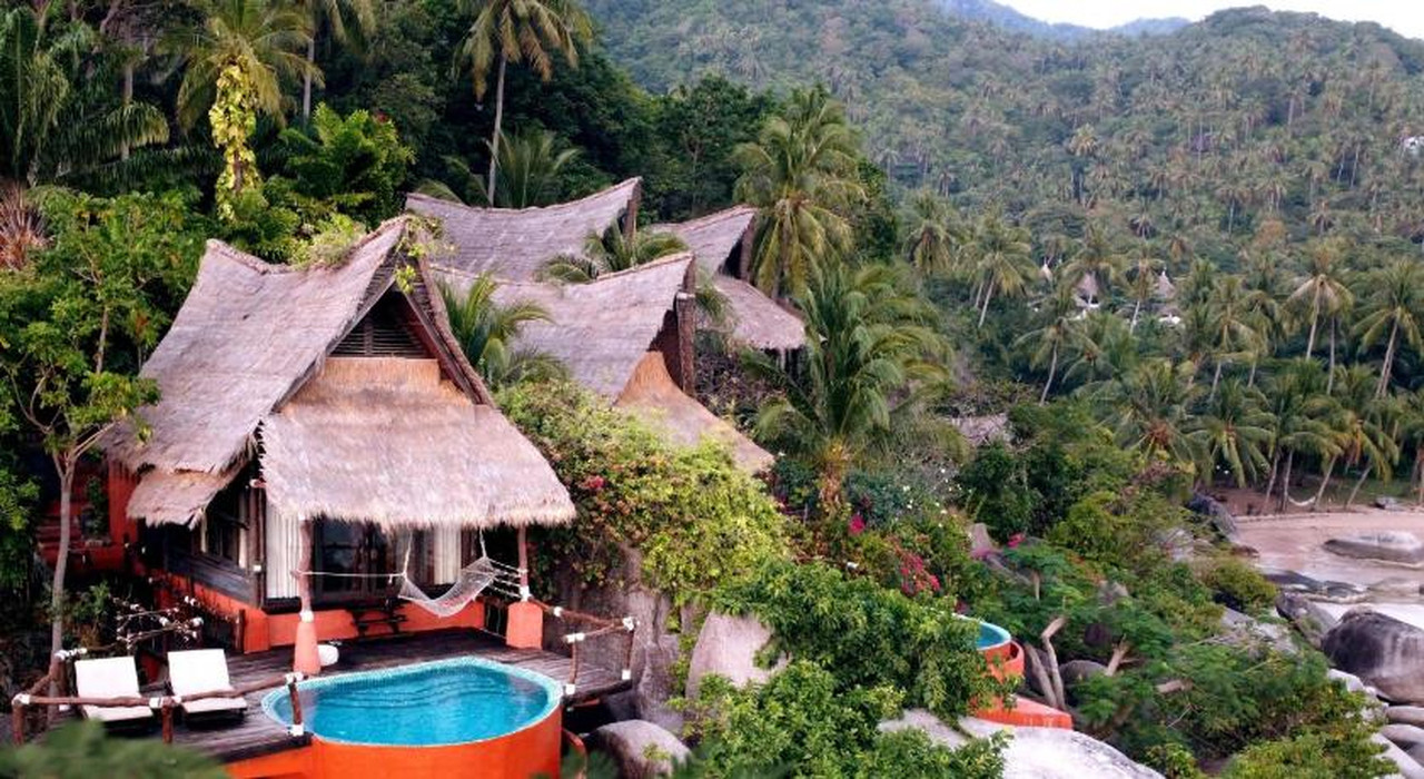 Thatched villa with a private plunge pool on the hillside above the beach at Koh Tao Cabana