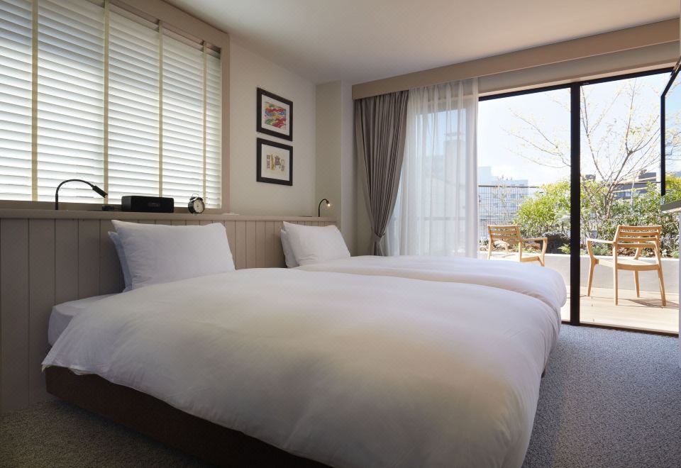 ห้องพักสไตล์ตะวันตกพร้อมระเบียงวิวสวนของ Matsumoto Hotel Kagetsu มัตสึโมโตะ