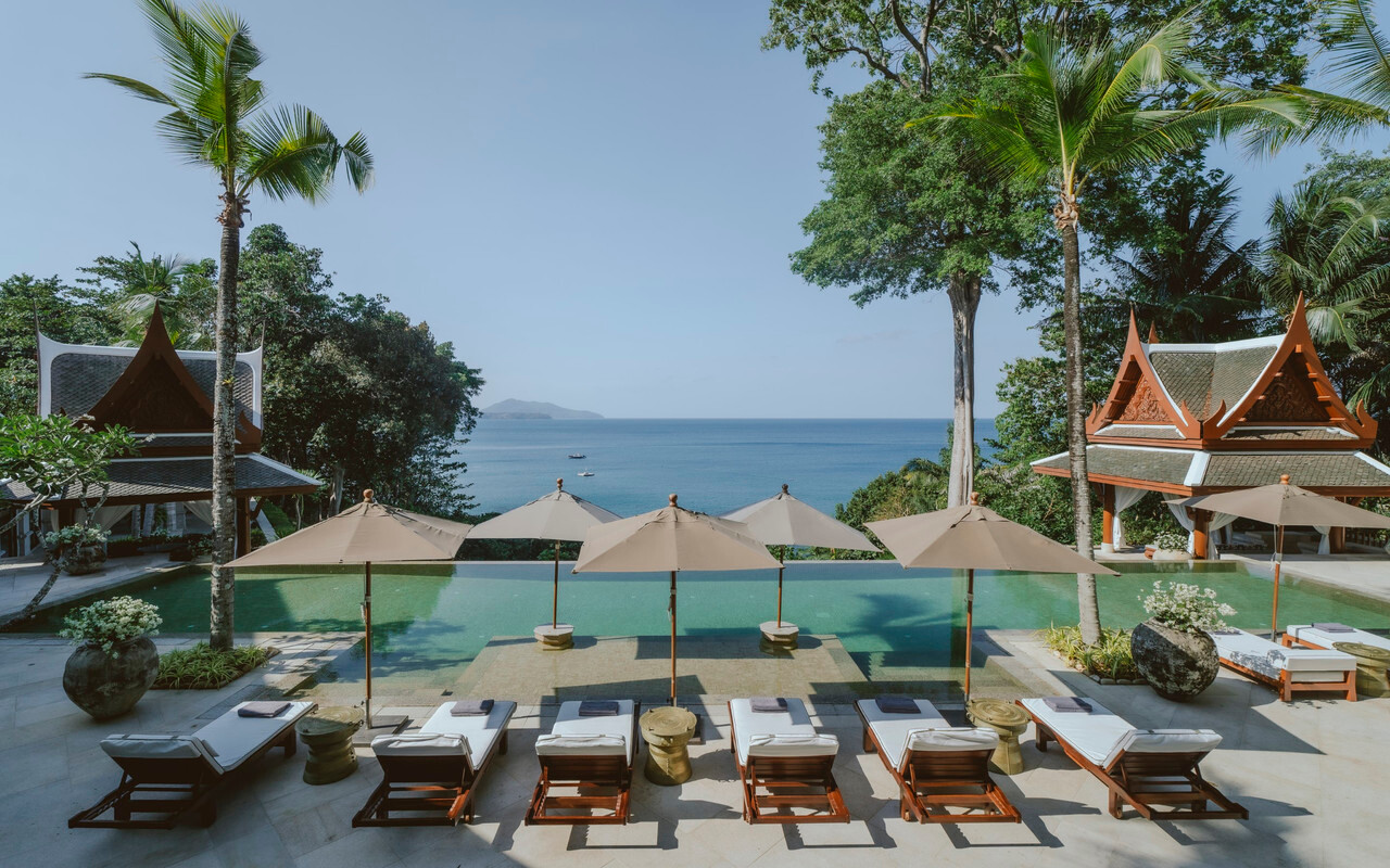 Main resort pool and Thai-roofed pavilions facing the sea