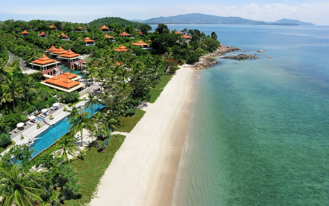 Aerial view of Trisara resort along its private bay and beach