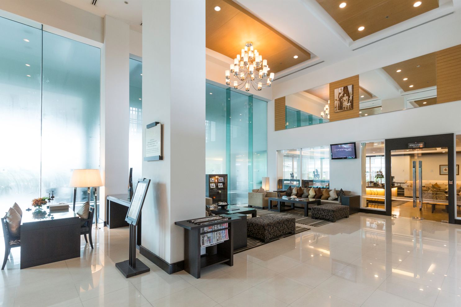 Double-height lobby with chandelier and the Executive Lounge entrance