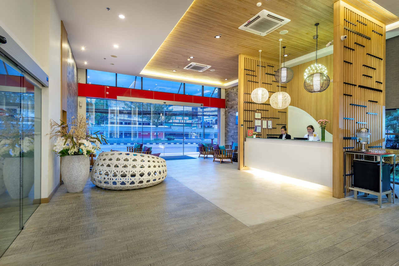 Lobby with Asian timber-screen design and reception desk
