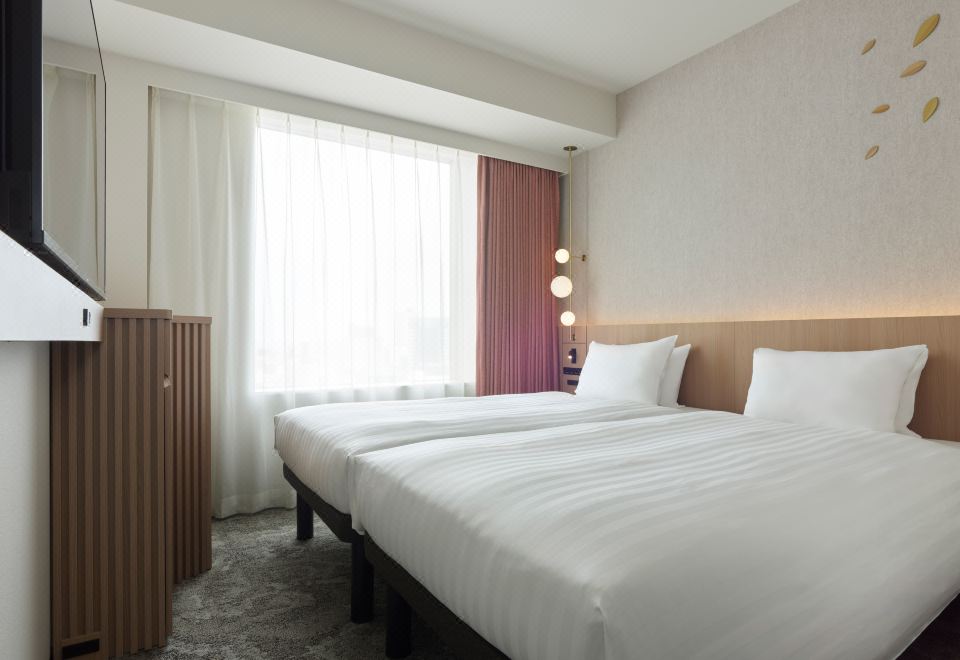 ห้องพักสไตล์ร่วมสมัย Mitsui Garden Hotel Sendai เตียงคู่สะอาดโล่ง