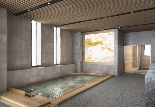 อ่างน้ำสาธารณะชั้น 18 Mitsui Garden Hotel Sendai ออกแบบด้วยไม้และหิน