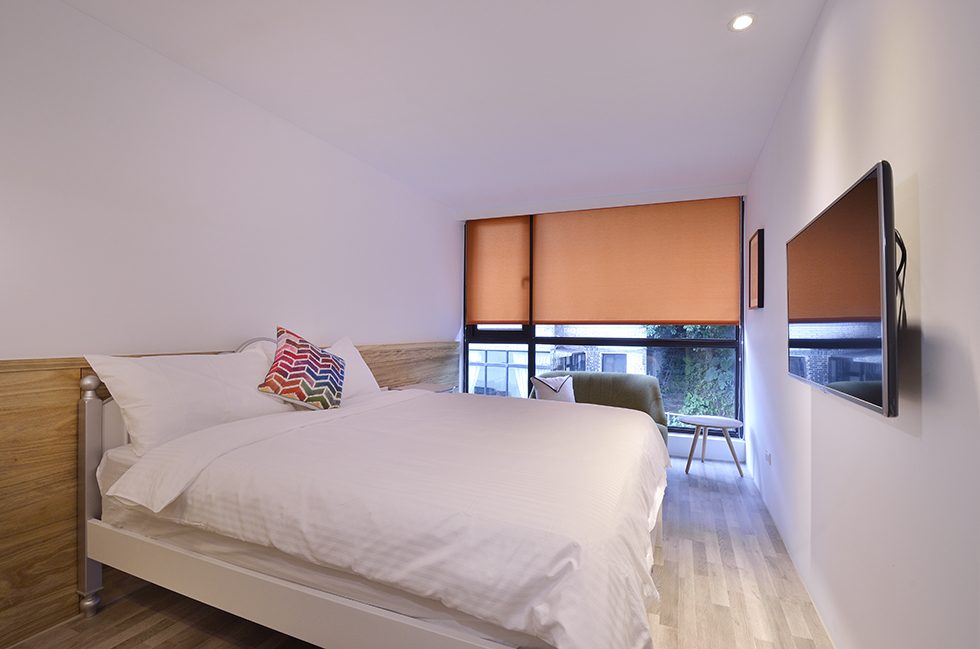 Jiufen hillside panorama and sea view — the kind of scenery visible from the property's sea-view rooms