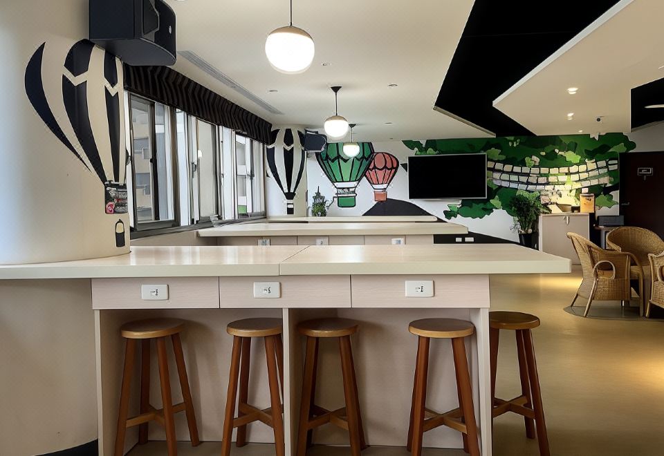 Shared bathroom and common areas at Hey Bear Capsule Hotel