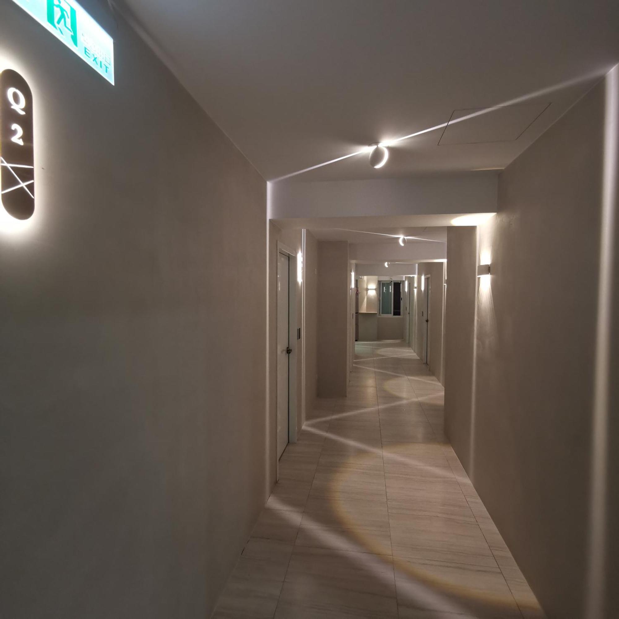 Enclosed capsule pods with personal lighting at TW Capsule Hostel